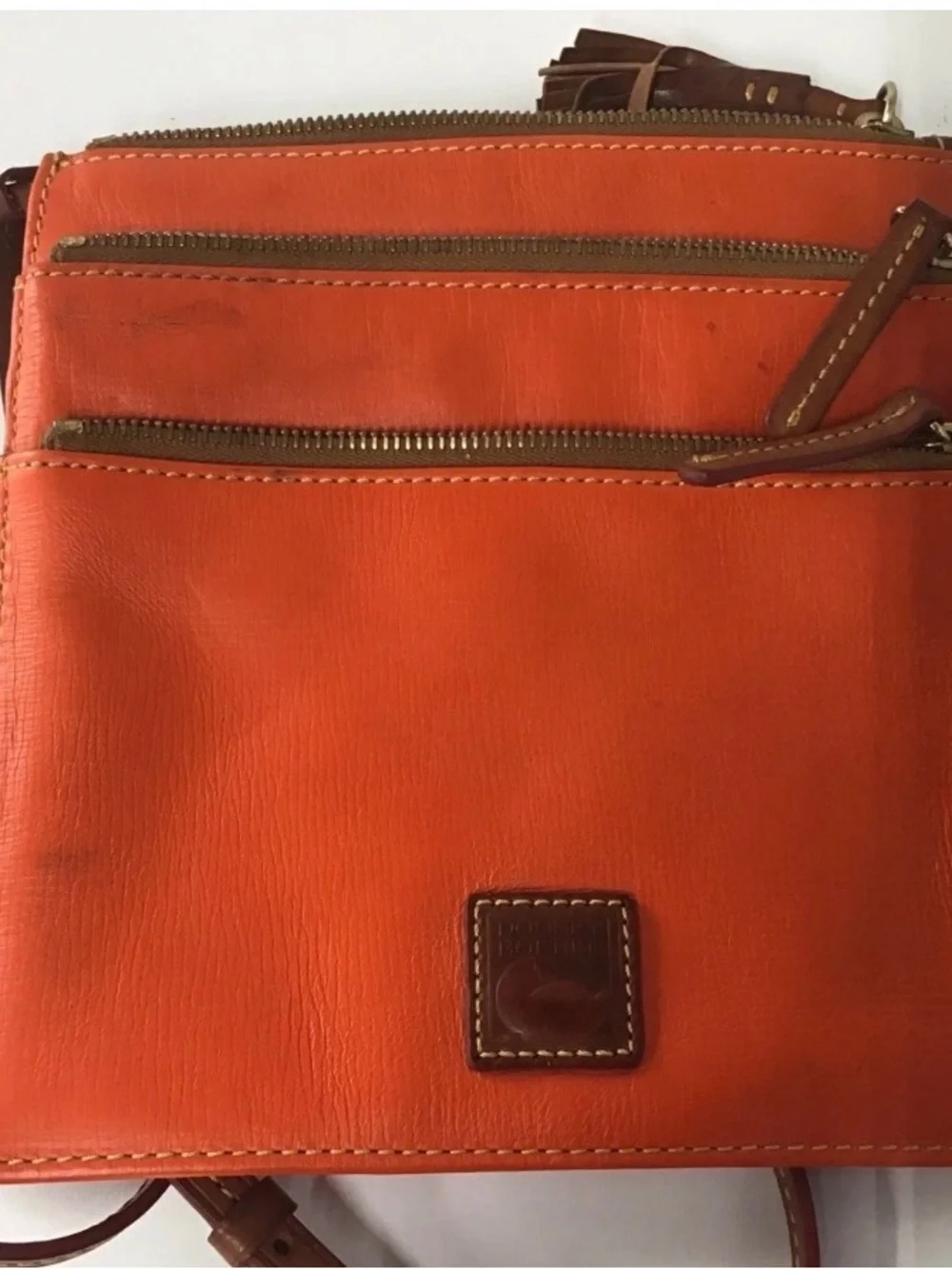 Dooney & Bourke Orange Leather Messenger Bag with Brown Trim